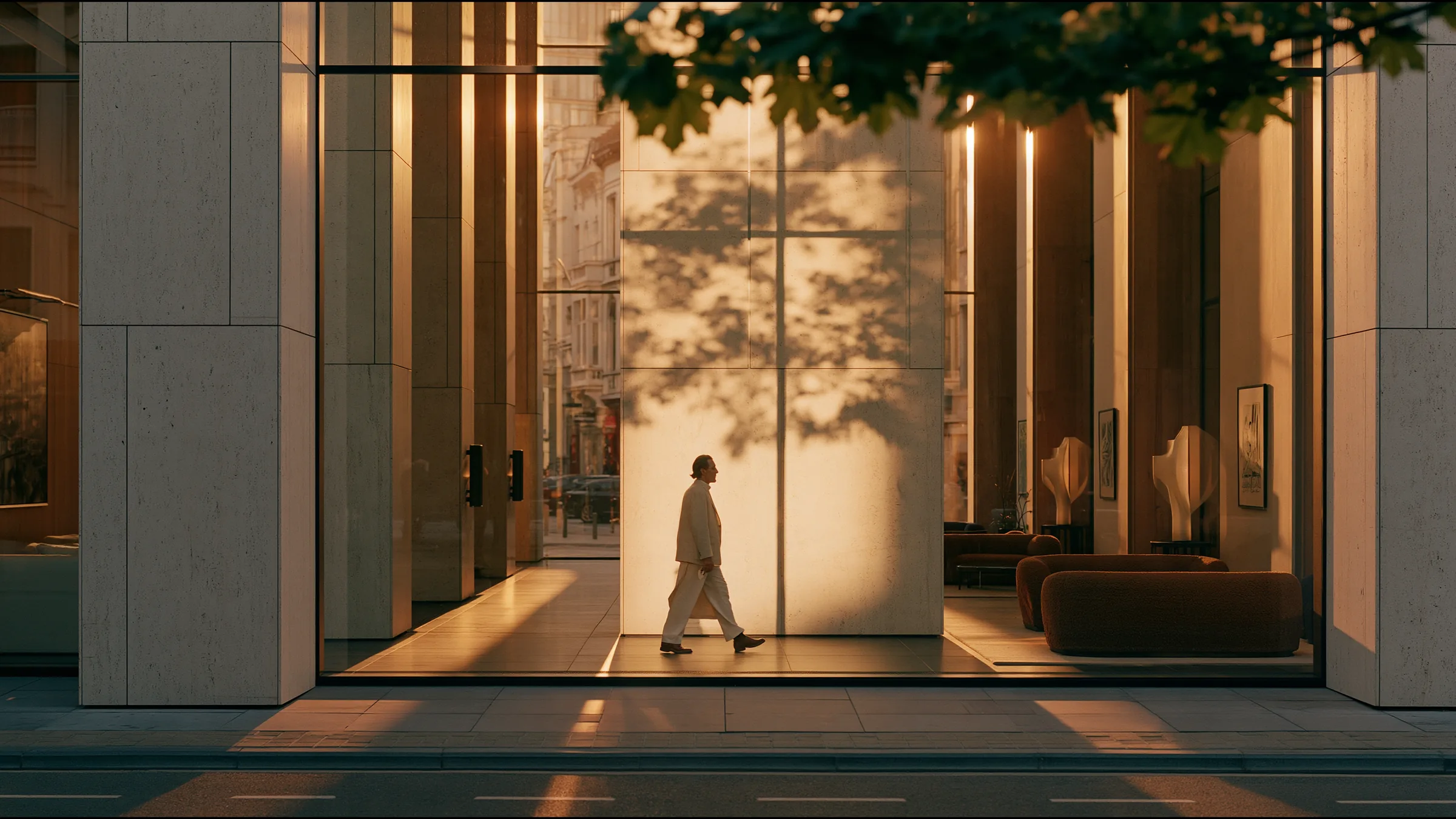 A clinician at ease in a vast, light-filled private clinic in Antwerp, the city beyond the glass