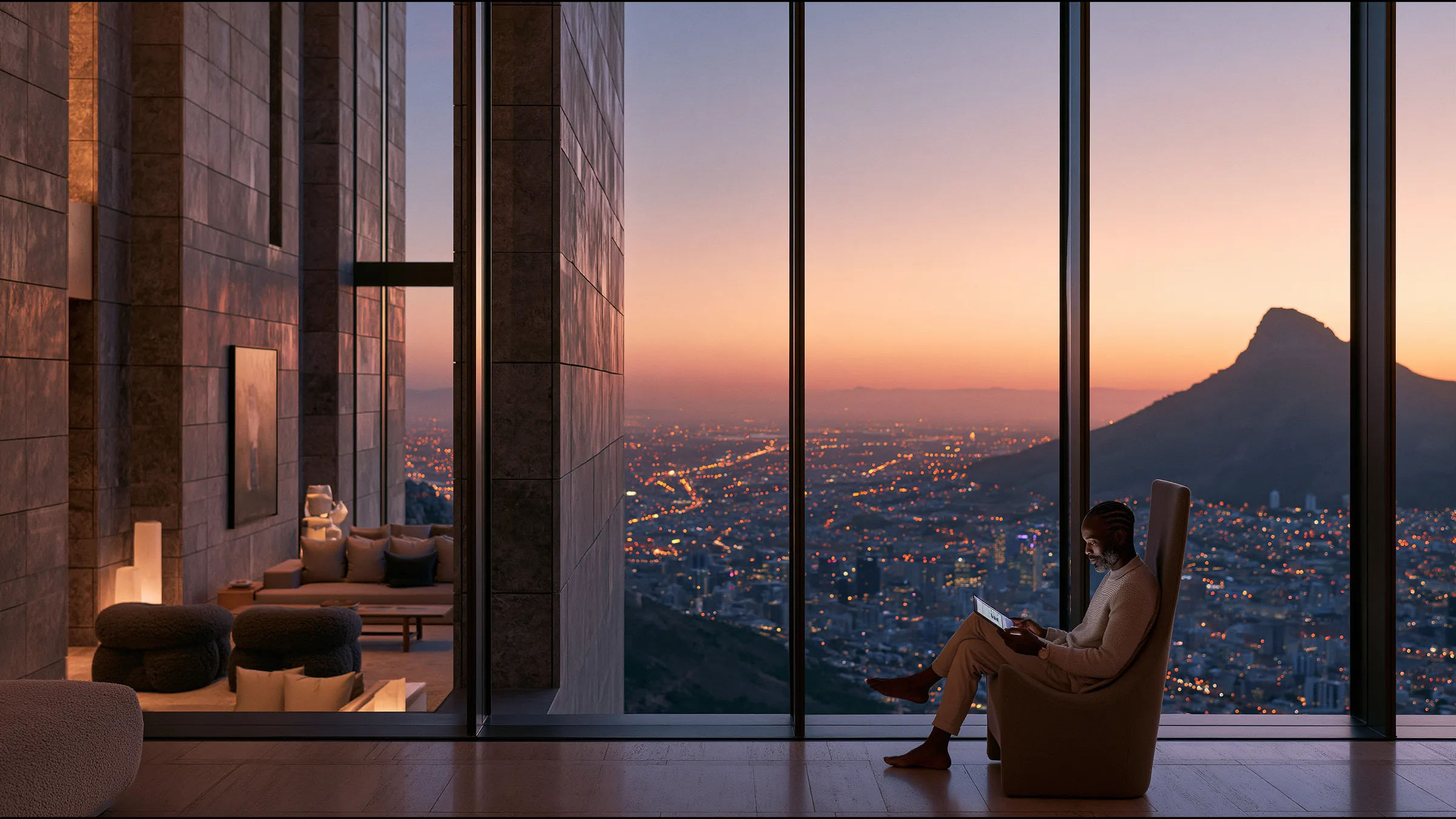 A clinician at ease in a vast, light-filled private clinic in Cape Town, the city beyond the glass