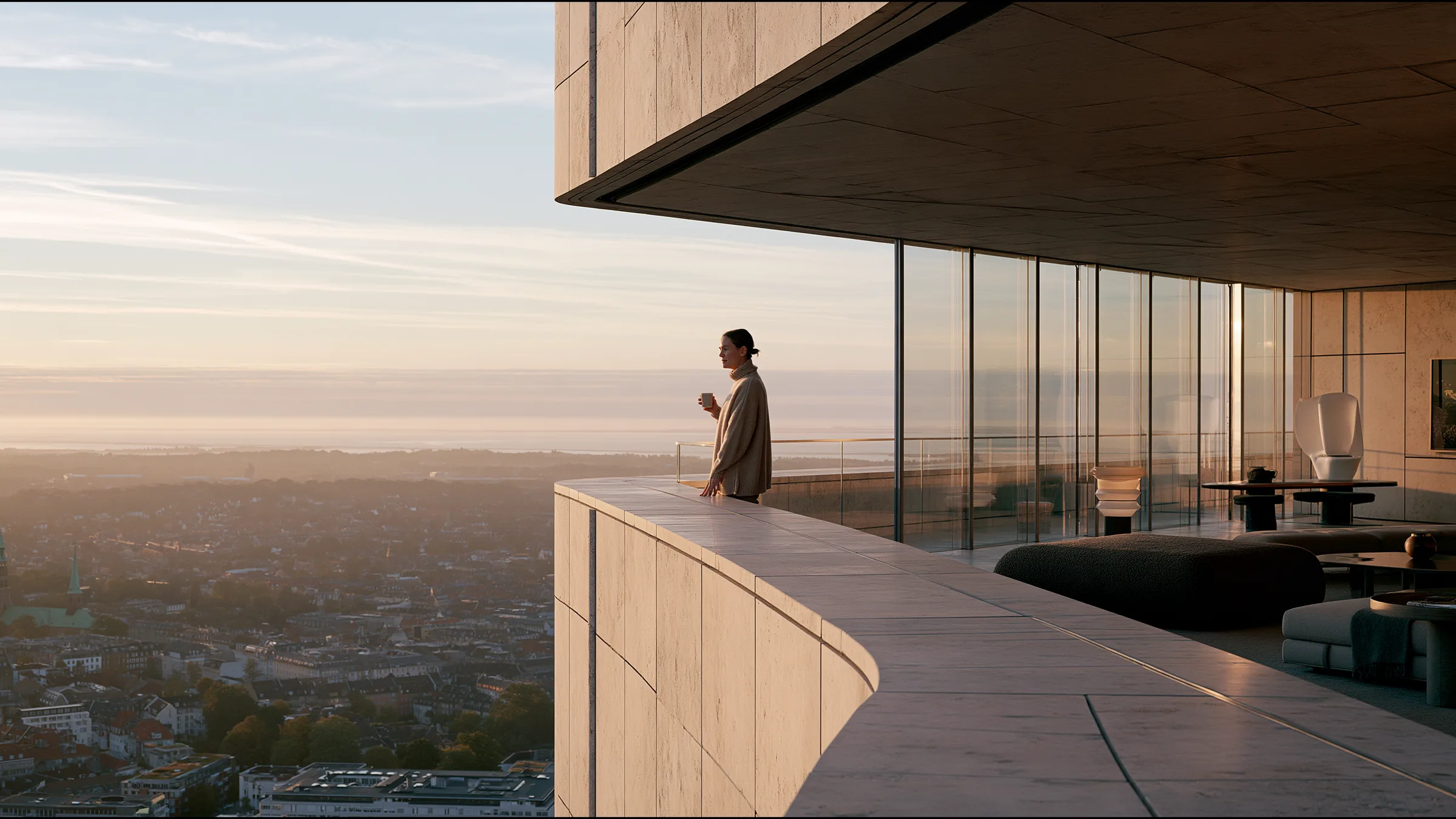 A clinician at ease in a vast, light-filled private clinic in Copenhagen, the city beyond the glass