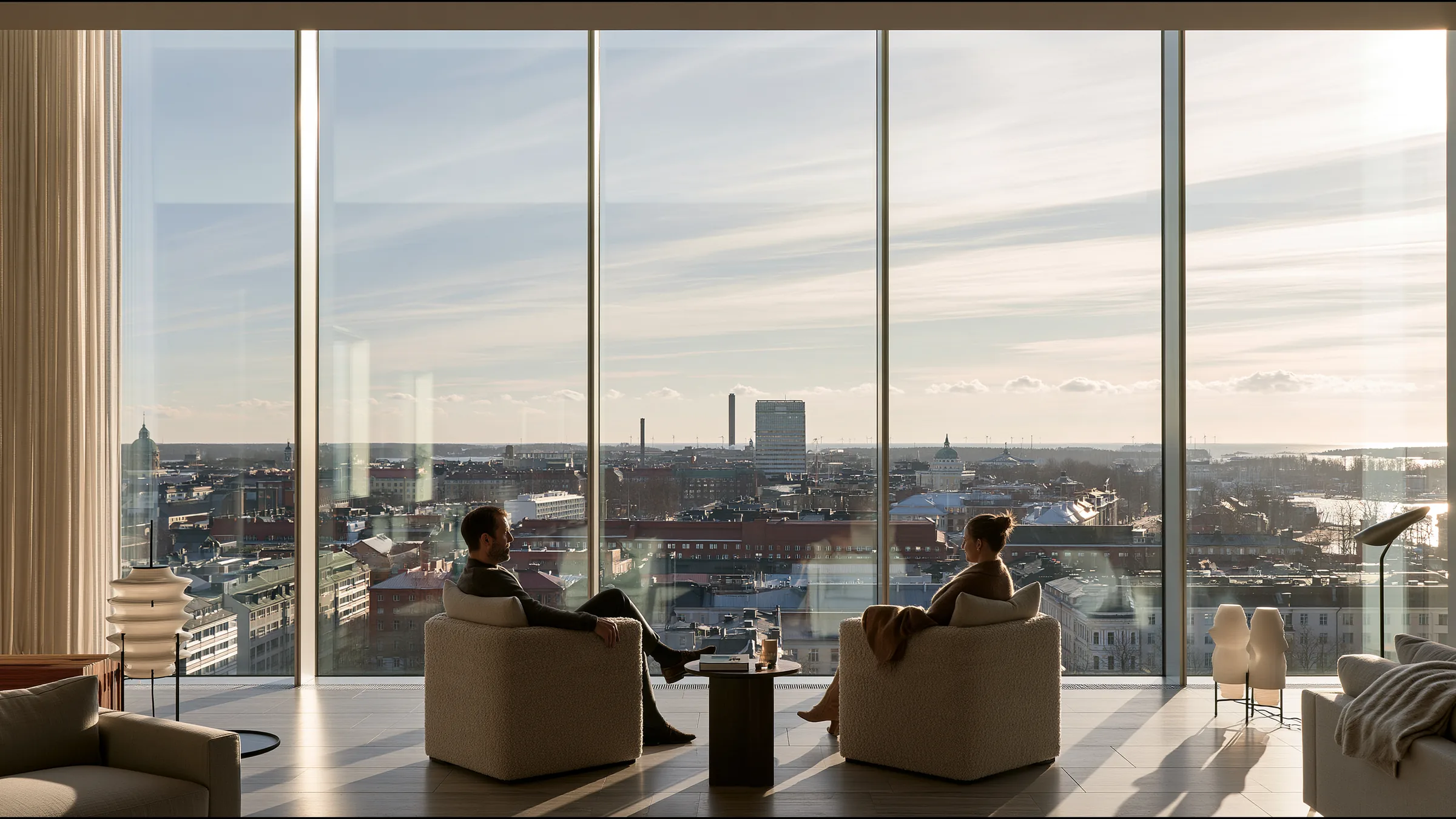 A clinician at ease in a vast, light-filled private clinic in Helsinki, the city beyond the glass