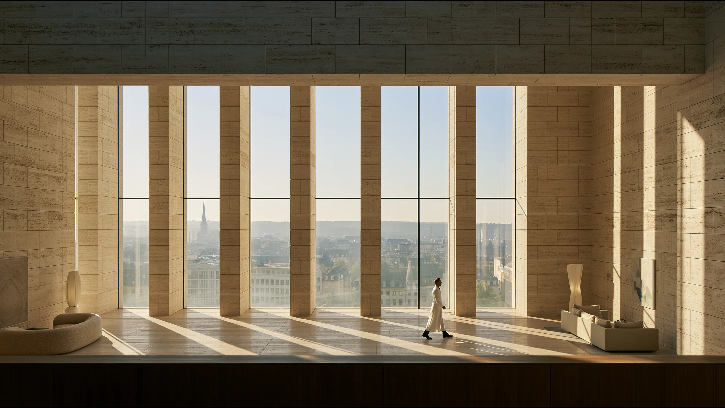 A clinician at ease in a vast, light-filled private clinic in Luxembourg City, the city beyond the glass