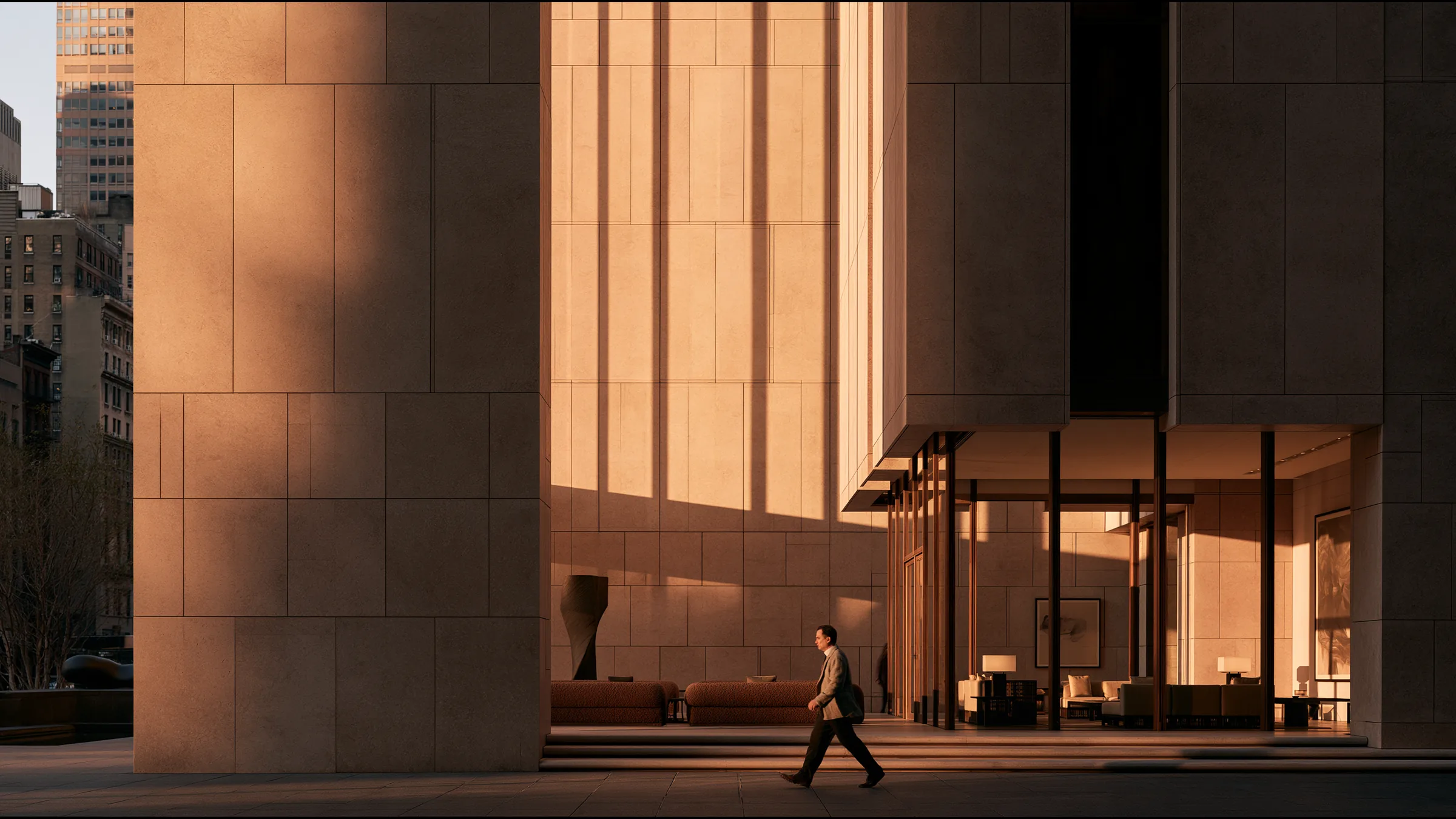 A clinician at ease in a vast, light-filled private clinic in New York City, the city beyond the glass