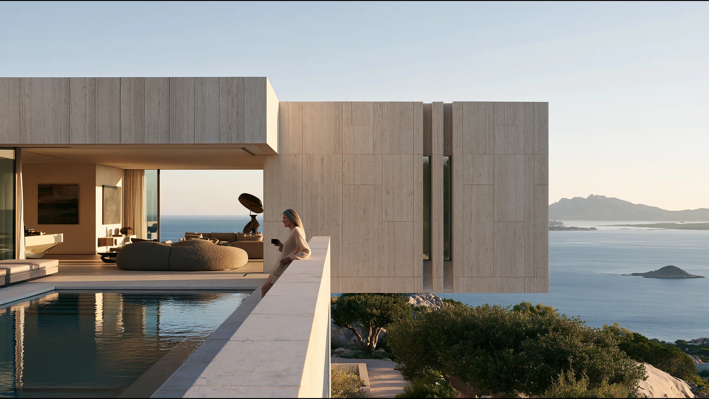 A clinician at ease in a vast, light-filled private clinic in Porto Cervo, the city beyond the glass