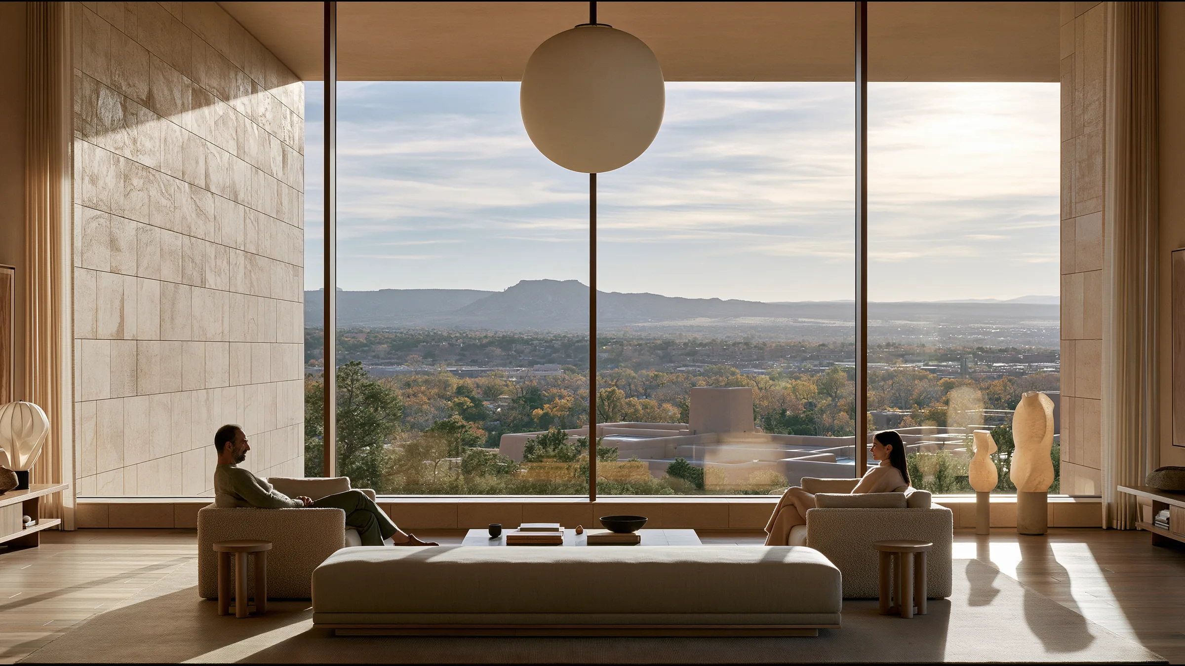 A clinician at ease in a vast, light-filled private clinic in Santa Fe, the city beyond the glass