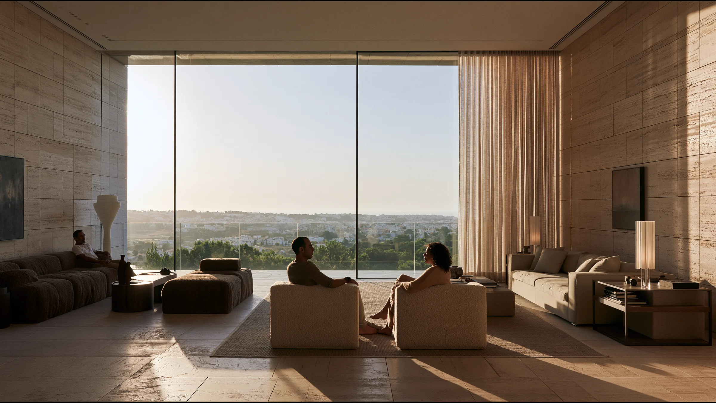 A clinician at ease in a vast, light-filled private clinic in The Algarve, the city beyond the glass