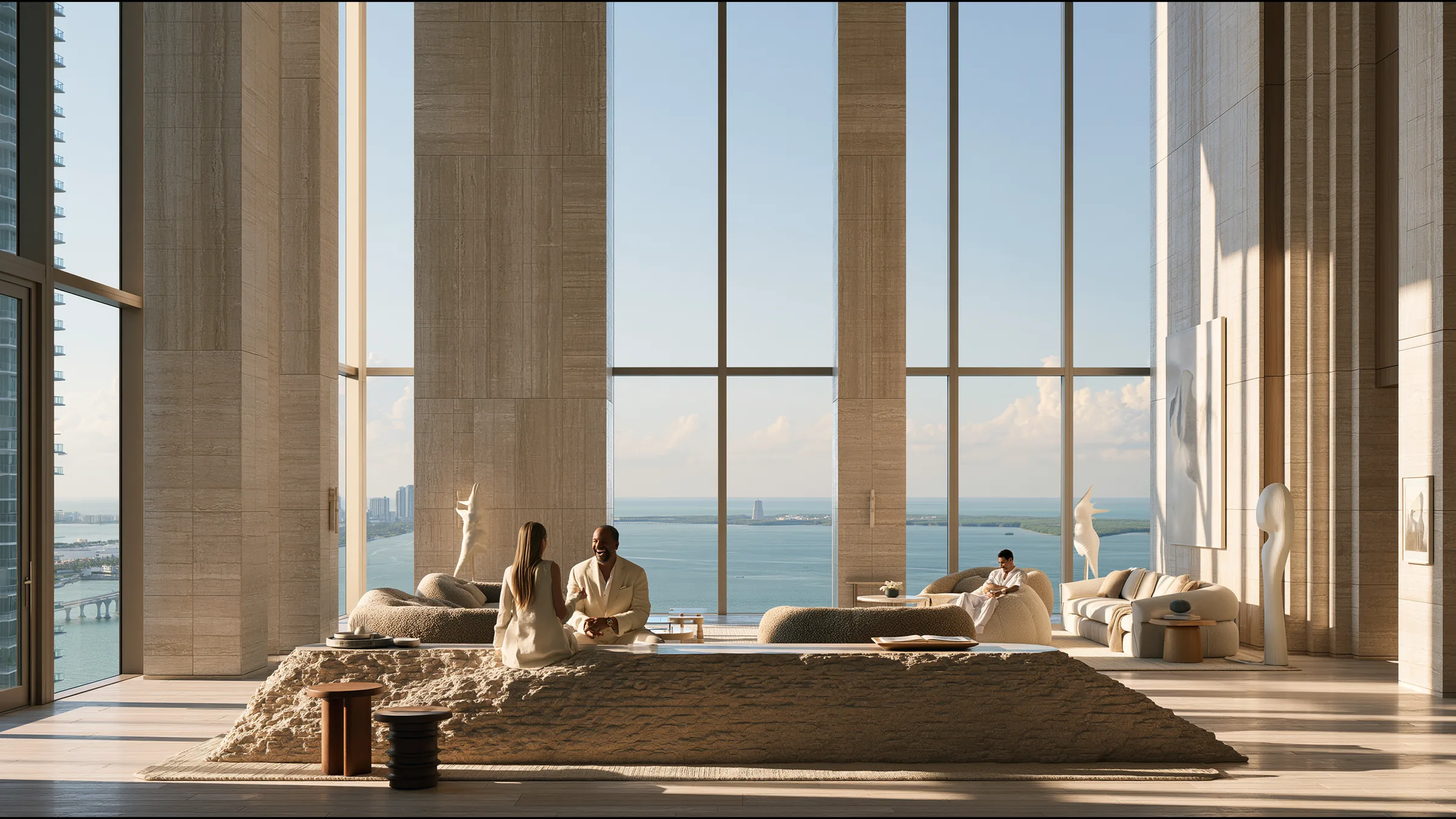 An aesthetic clinic director laughing with a returning patient at a sculptural stone reception in a soaring Brickell clinic in Miami, both Biscayne Bay through a wall of glass